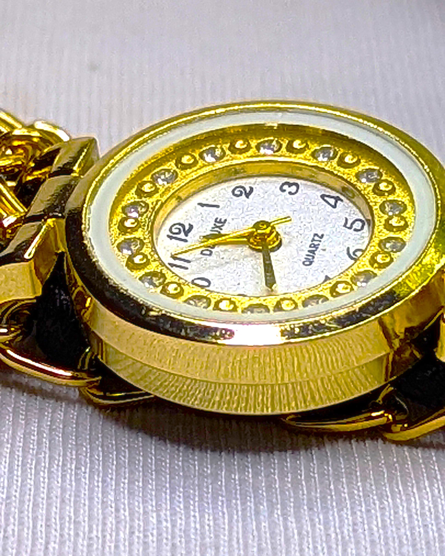 Elegant Women's Gold Chain & Satin Weave Wristwatch